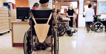 Nursing home residents in wheelchairs