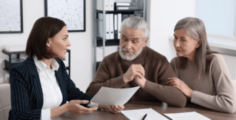 An older couple meets with an attorney